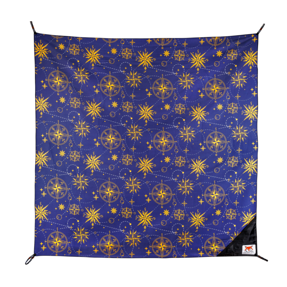 product photo of dryfoxco waves print beach blanket on white background back side with compass print